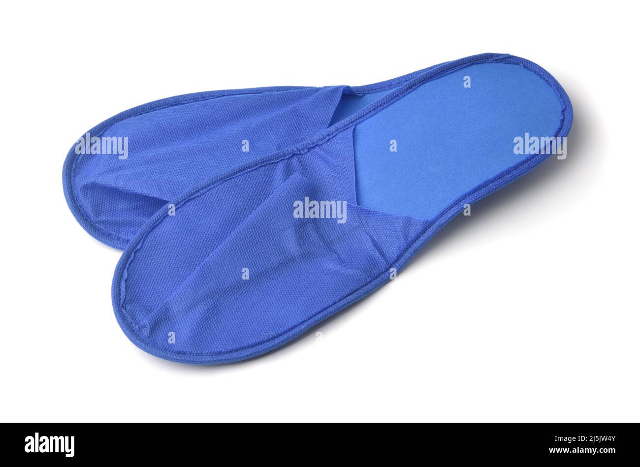 Pair of blue disposable slippers isolated on white Stock Photo