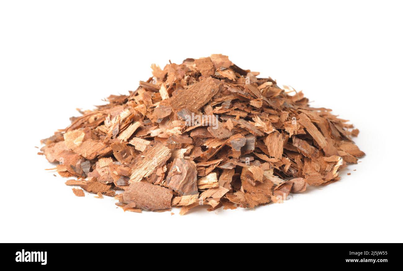 Heap of pine bark mulch chips isolated on white Stock Photo