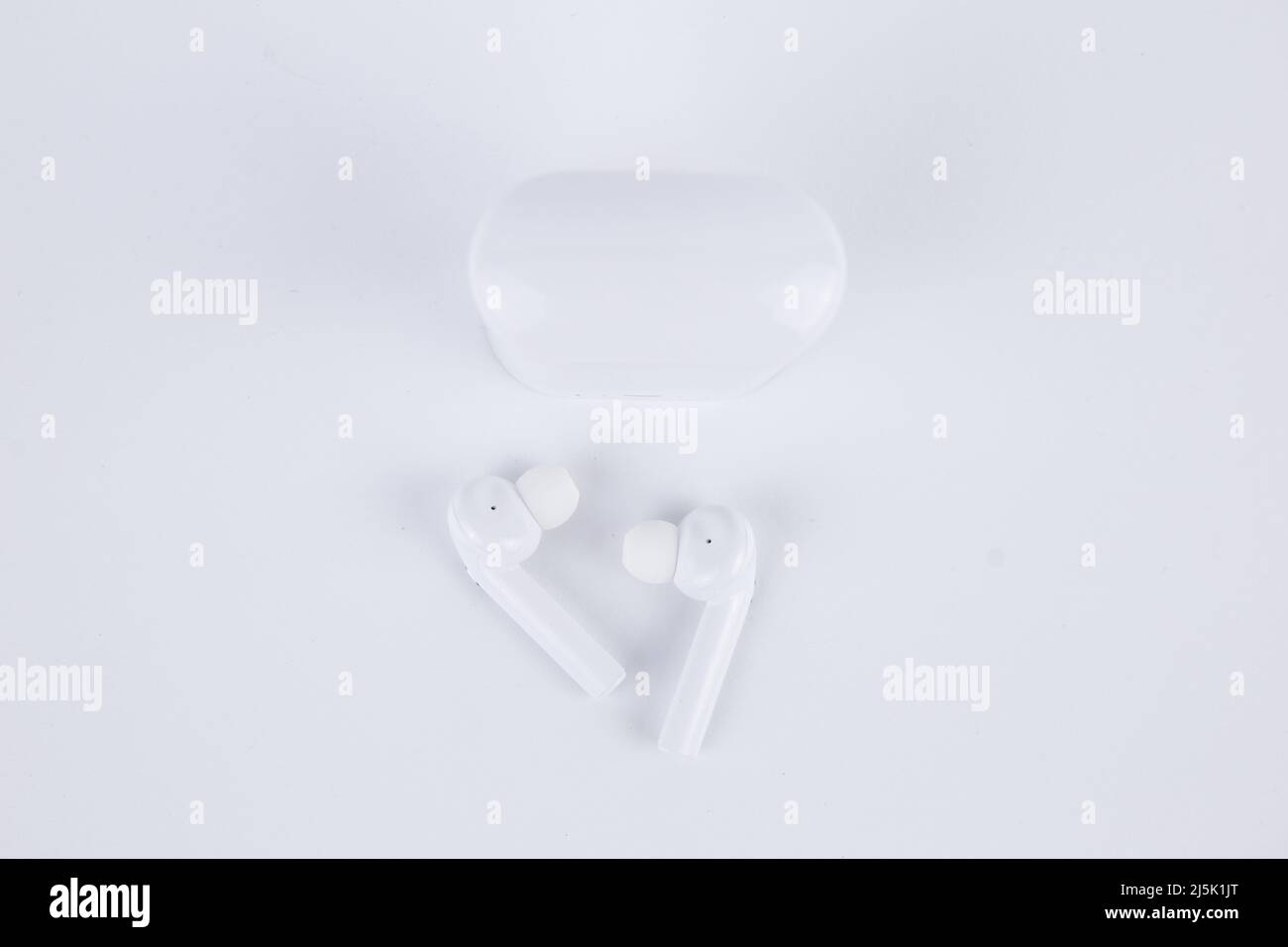 a white wireless headphones isolated on white background Stock Photo ...