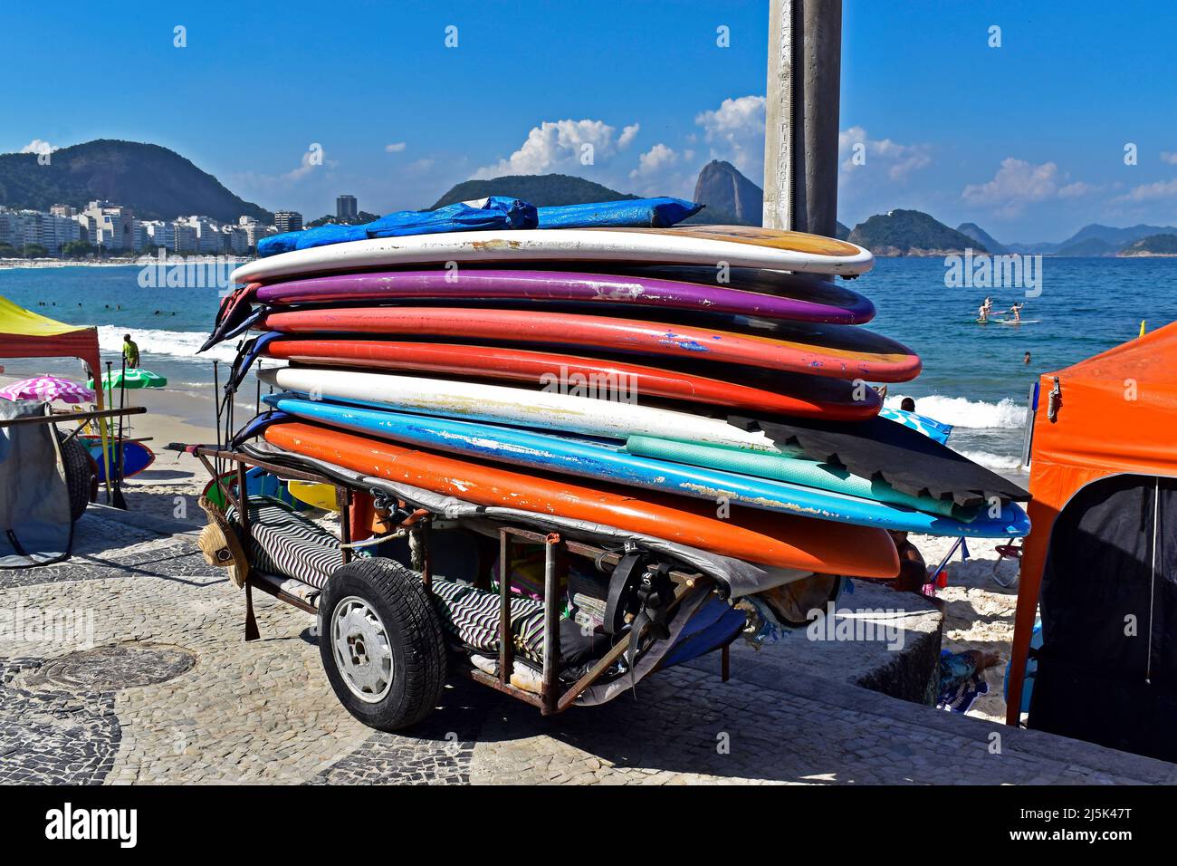 Stack of stand up paddle boards in Copacabana Beach, Rio Stock Photo