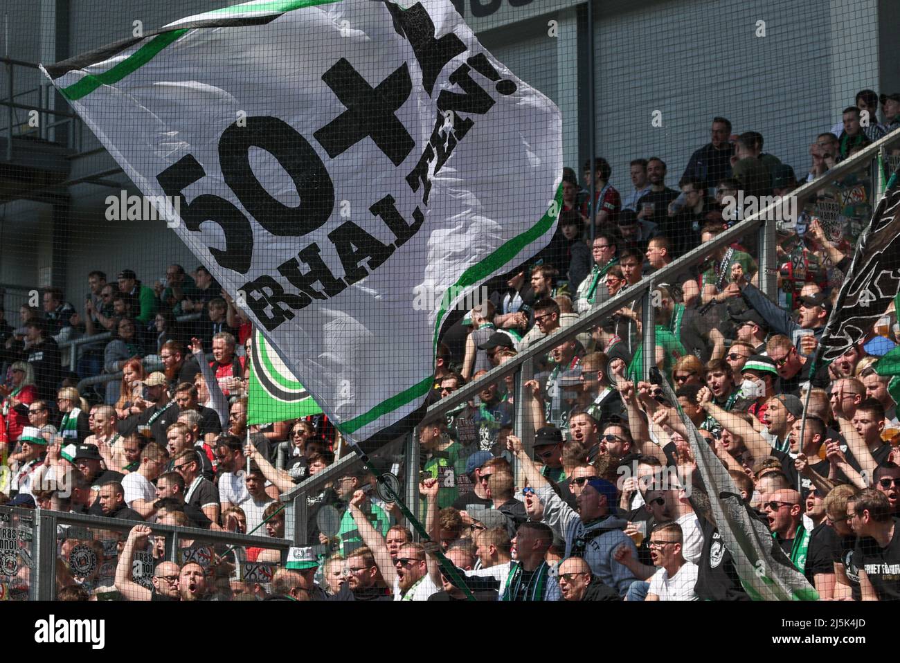 Paderborn, Germany. 24th Apr, 2022. Soccer: 2nd Bundesliga, SC Paderborn 07 - Hannover 96, Matchday 31 at Benteler Arena. 'Keep 50 1' is written on a banner of the fans from Hannover. Credit: Friso Gentsch/dpa - IMPORTANT NOTE: In accordance with the requirements of the DFL Deutsche Fußball Liga and the DFB Deutscher Fußball-Bund, it is prohibited to use or have used photographs taken in the stadium and/or of the match in the form of sequence pictures and/or video-like photo series./dpa/Alamy Live News Stock Photo