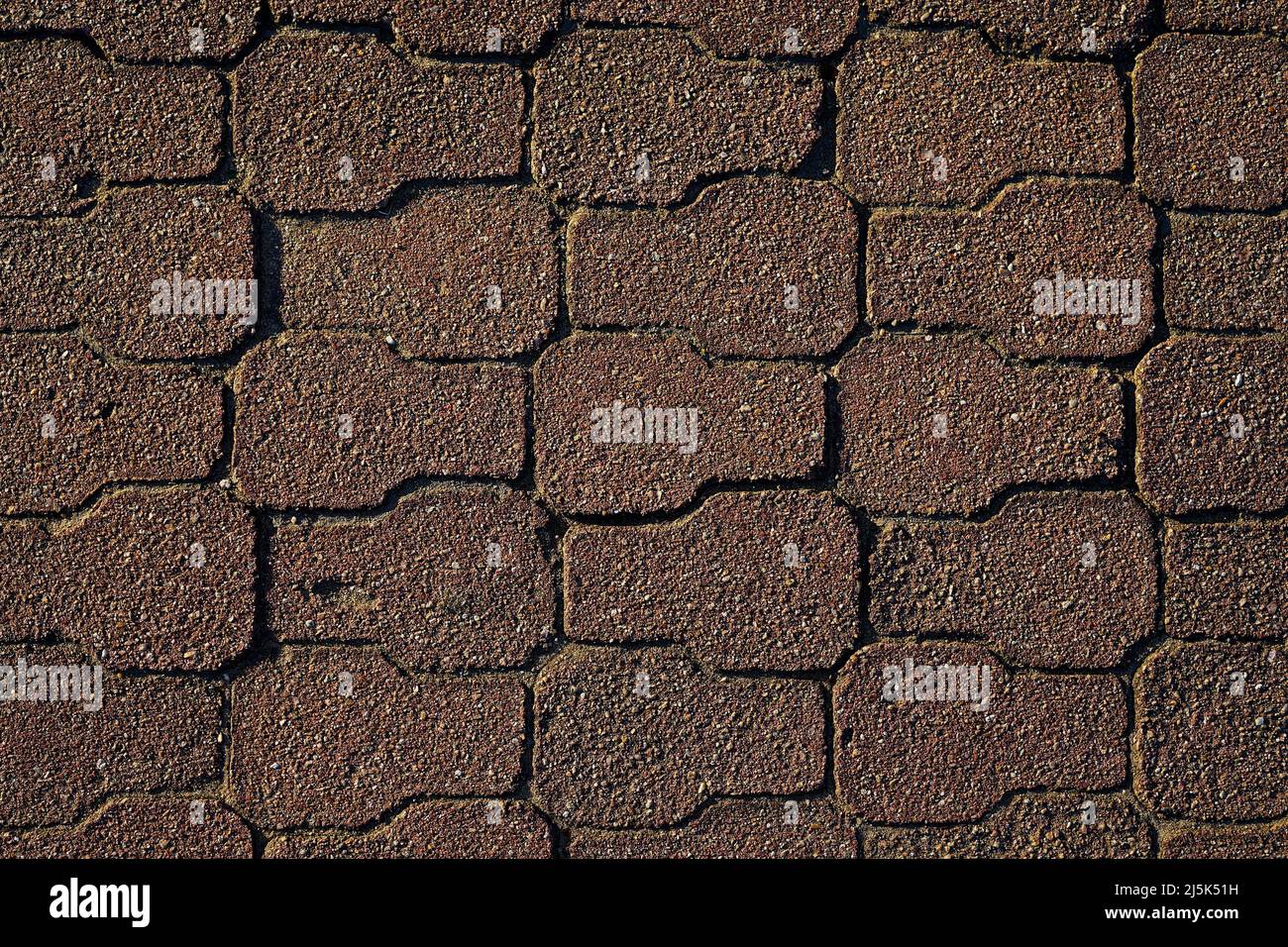 Patterned paving red bricks, cement brick floor Stock Photo