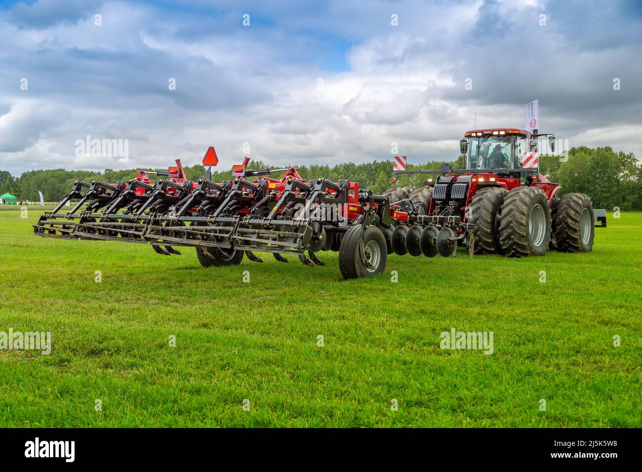 Russia, Leningrad Region - June, 2019: Working bodies of equipment for land cultivation. Agricultural machinery. Stock Photo