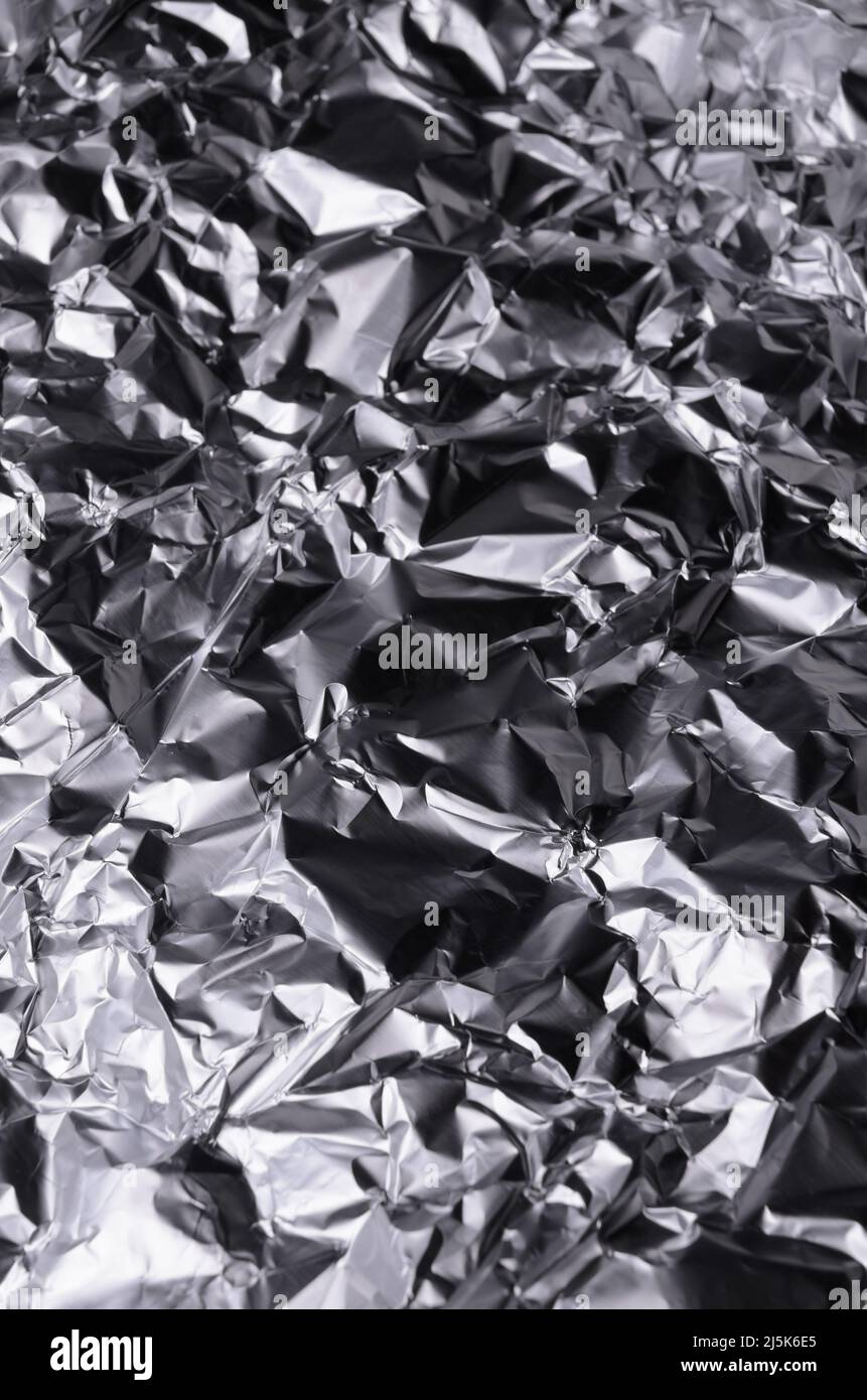 Crumpled aluminium foil hi-res stock photography and images - Alamy