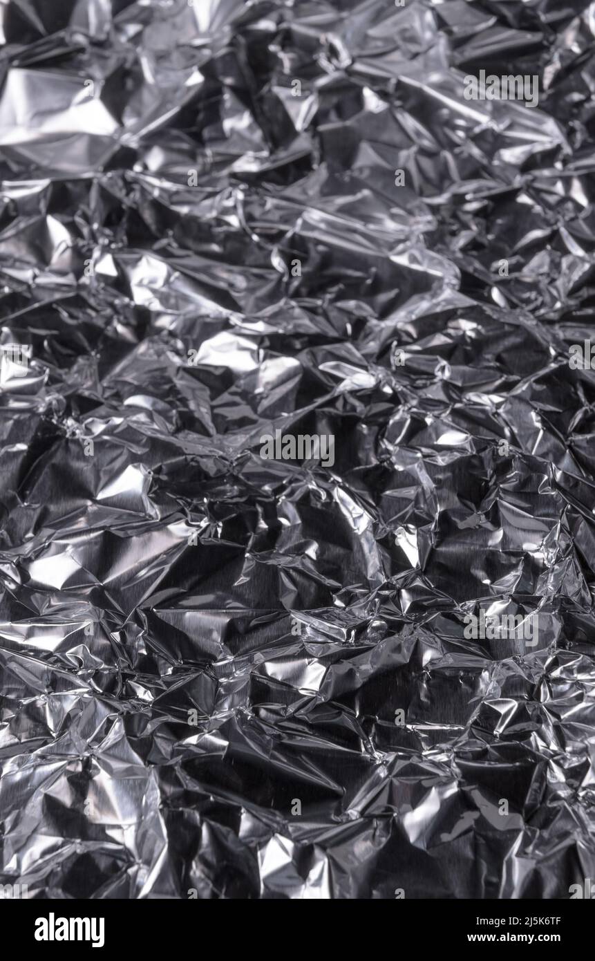 Abstract background of crumpled aluminium foil Stock Photo