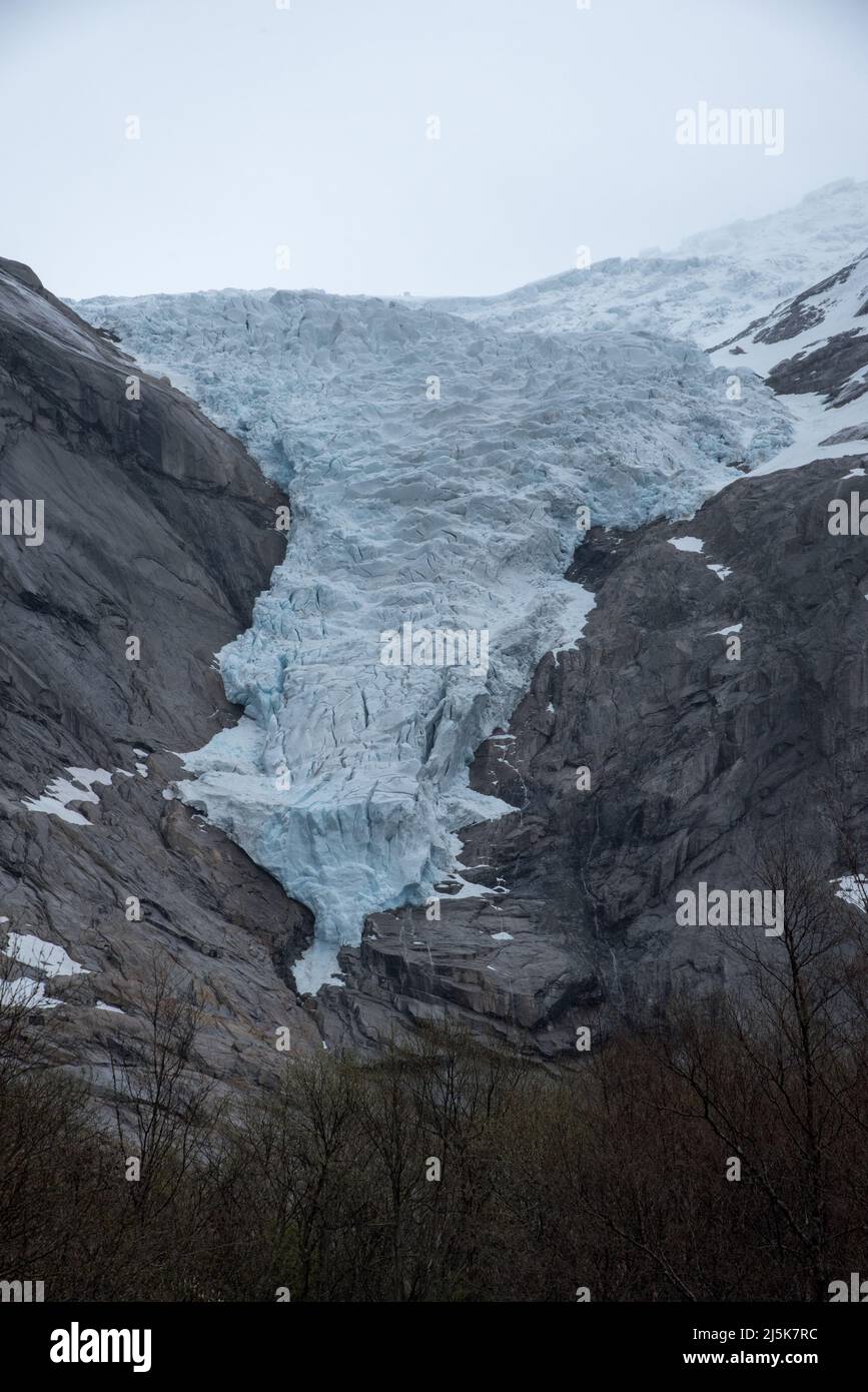 Briksdalsbreen is a glacier arm running down from Europe's largest continental glacierJostedalsbreen and Jostedalsbreen National Park in Norway. Stock Photo