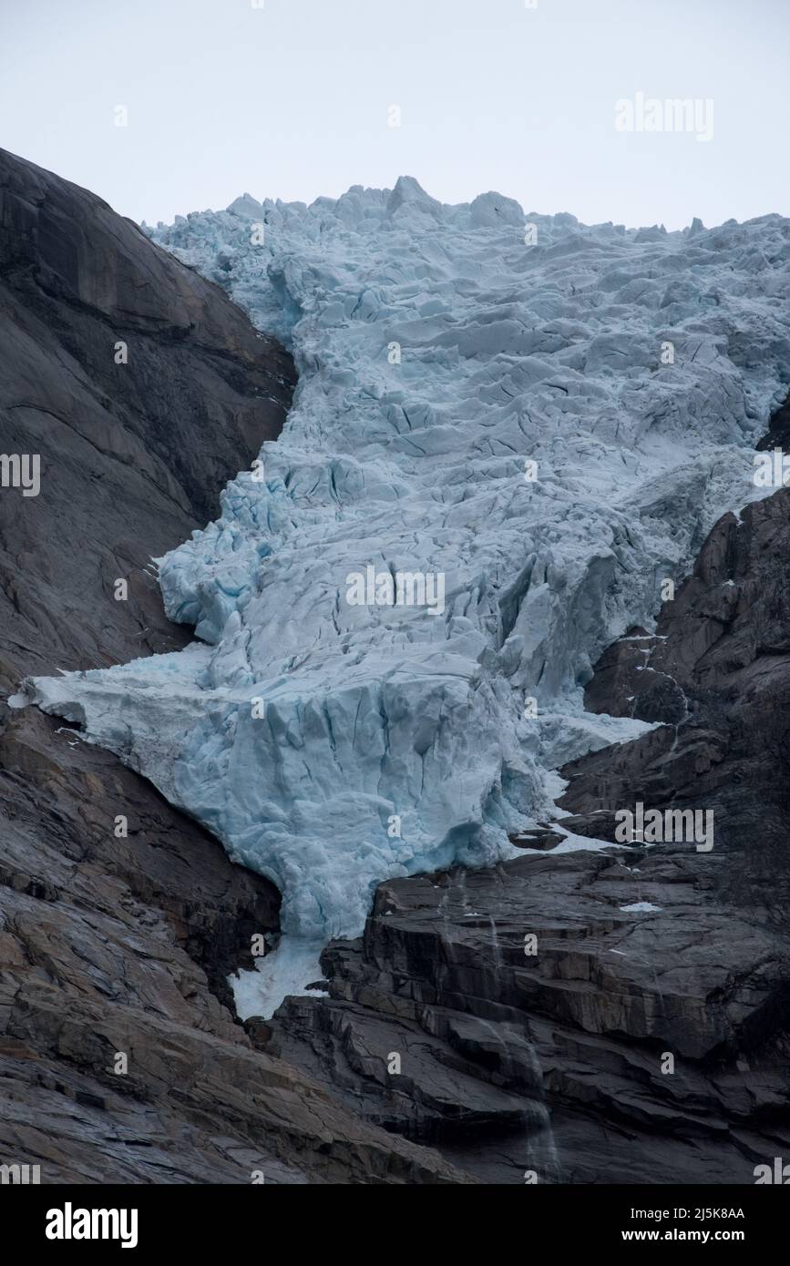 Briksdalsbreen is a glacier arm running down from Europe's largest continental glacierJostedalsbreen and Jostedalsbreen National Park in Norway. Stock Photo