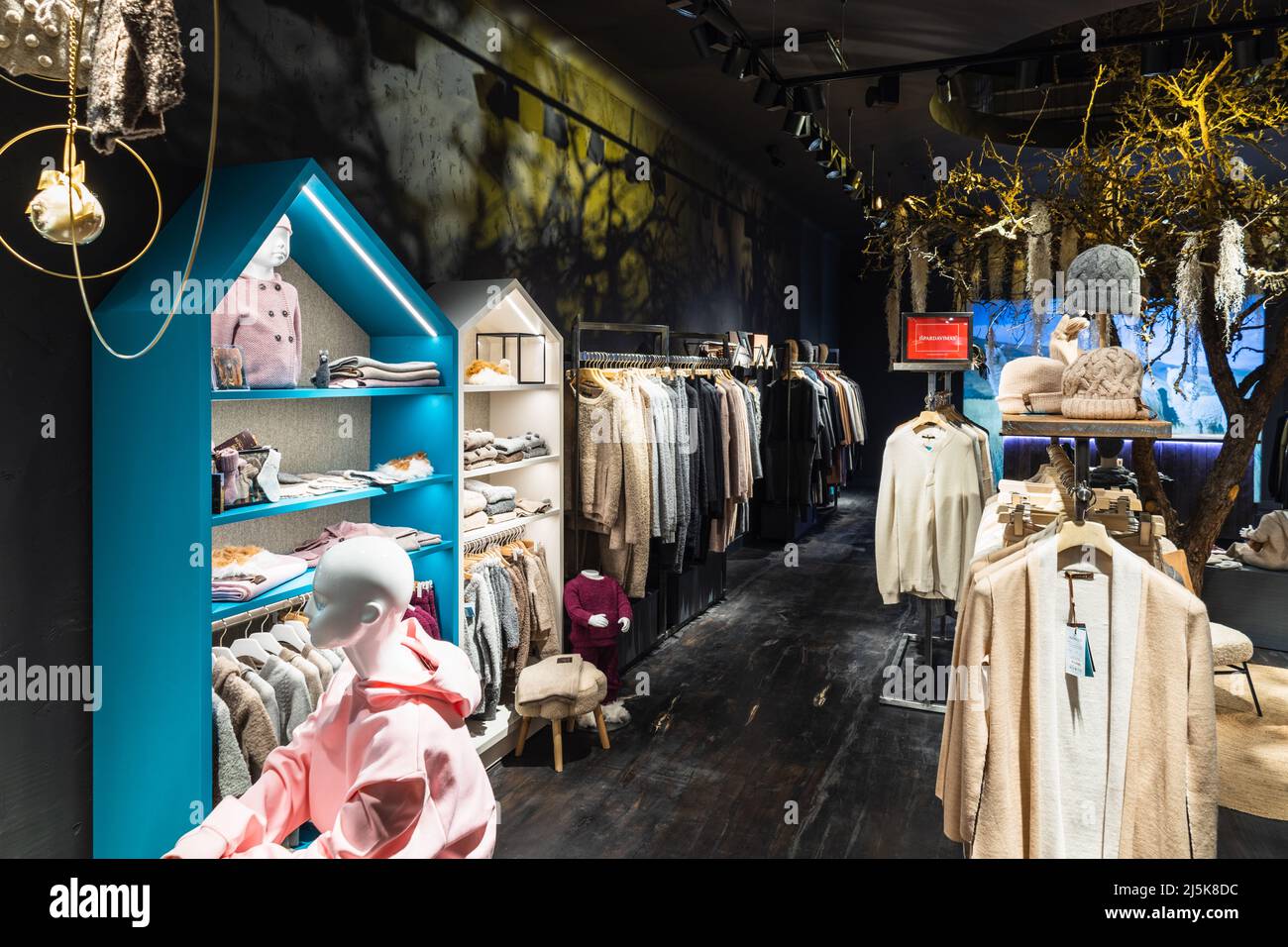 Luxury shopping mall department, clothing store interior. Panorama, Vilnius, Lithuania 10 April 2022 Stock Photo