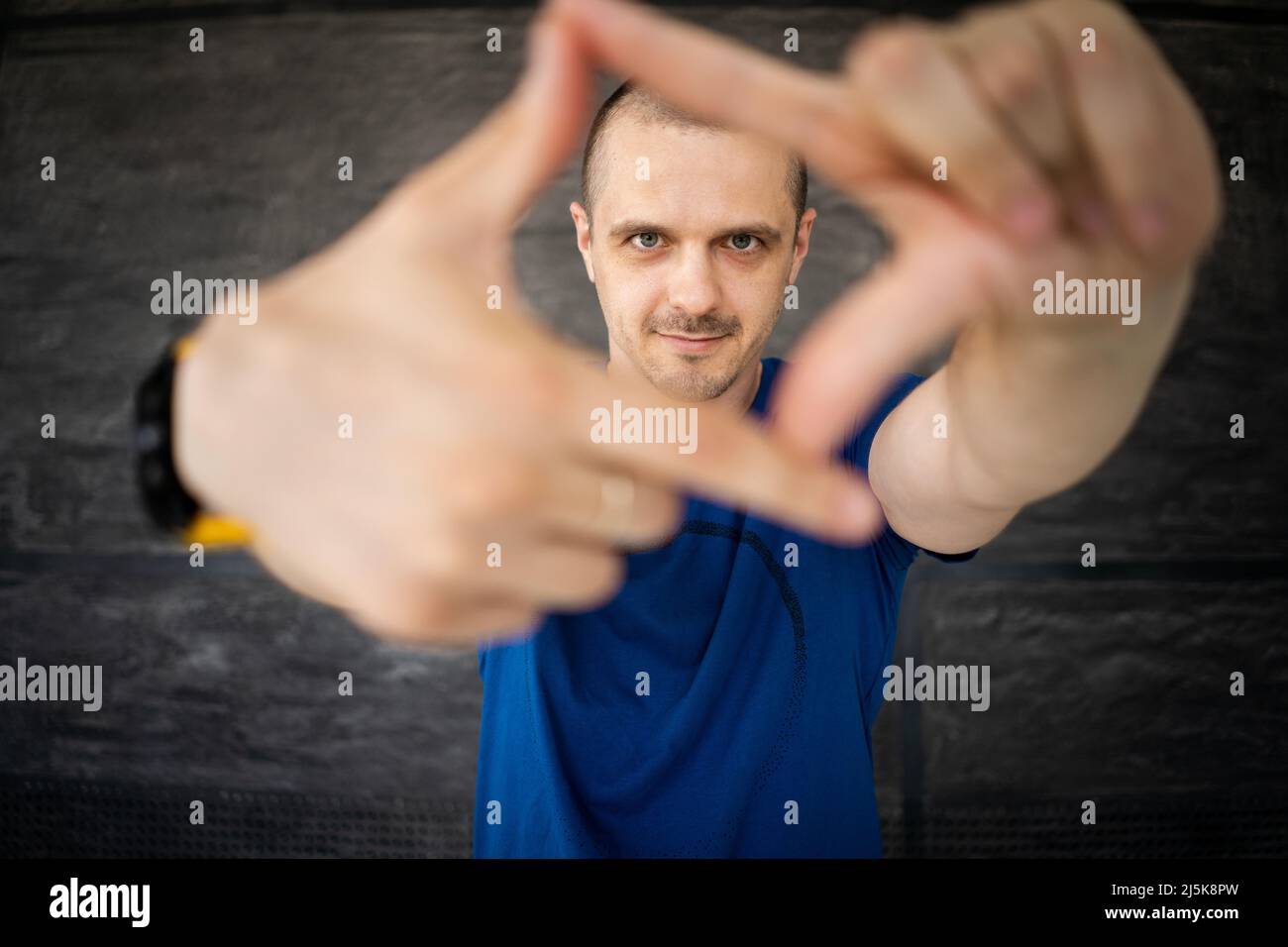 Portrait of adult man in blue t-shirt Stock Photo