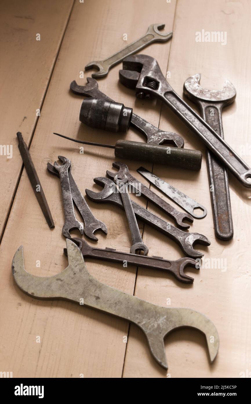 Old metal hand tools mainly various spanners Stock Photo