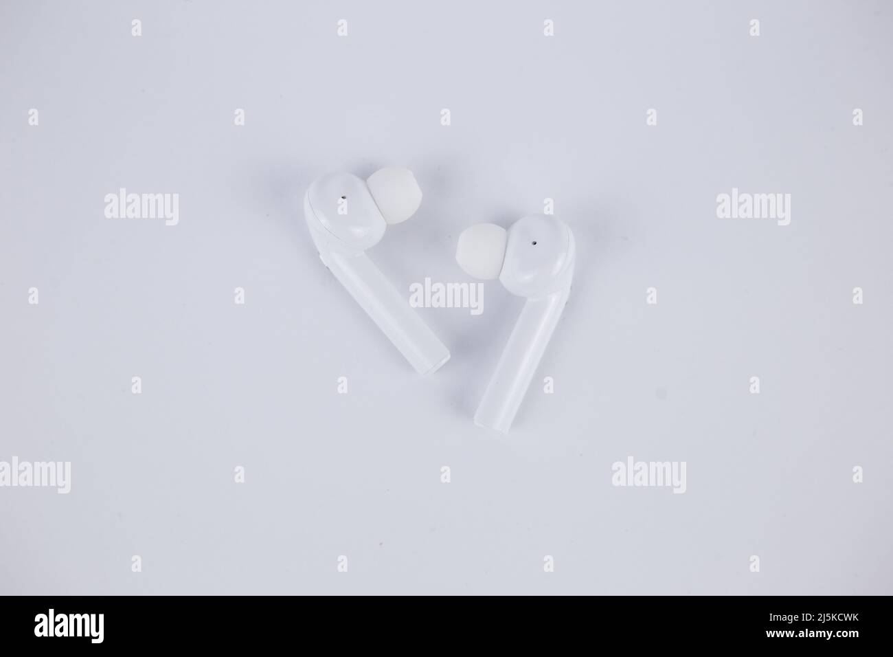 a white wireless headphones isolated on white background Stock Photo ...