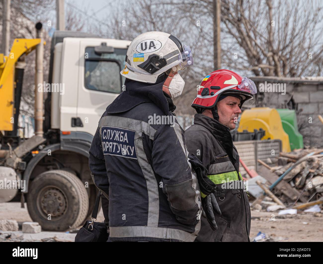 Borodyanka, Ukraine - April 2022: Search for people in the rubble of houses. Bombed houses of civilians. Rescuers are working on rubble of residential buildings in Ukraine. Bombed houses of civilians. Stock Photo