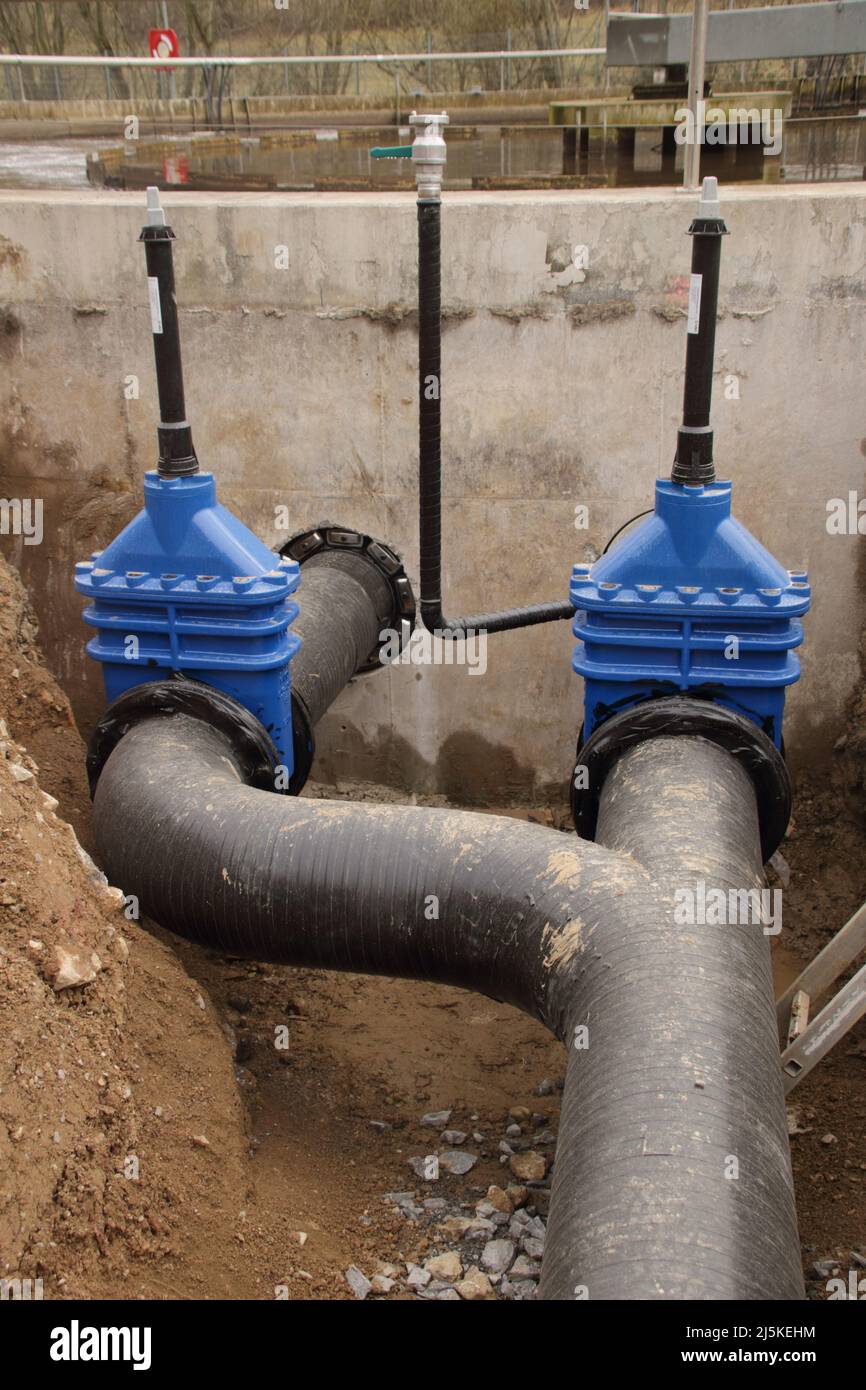 Gate valve and emergency bypass valve in front of an aeration tank in a sewage treatment plant Stock Photo