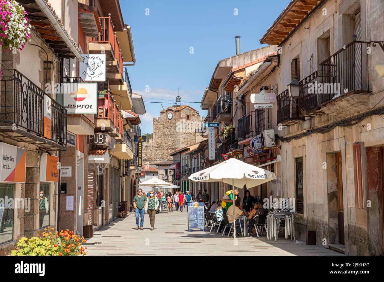 Buitrago del Lozoya, Spain. The Torre Albarrana, a city gate and defensive clock tower of the walled Old Town, seen from Calle Real Stock Photo