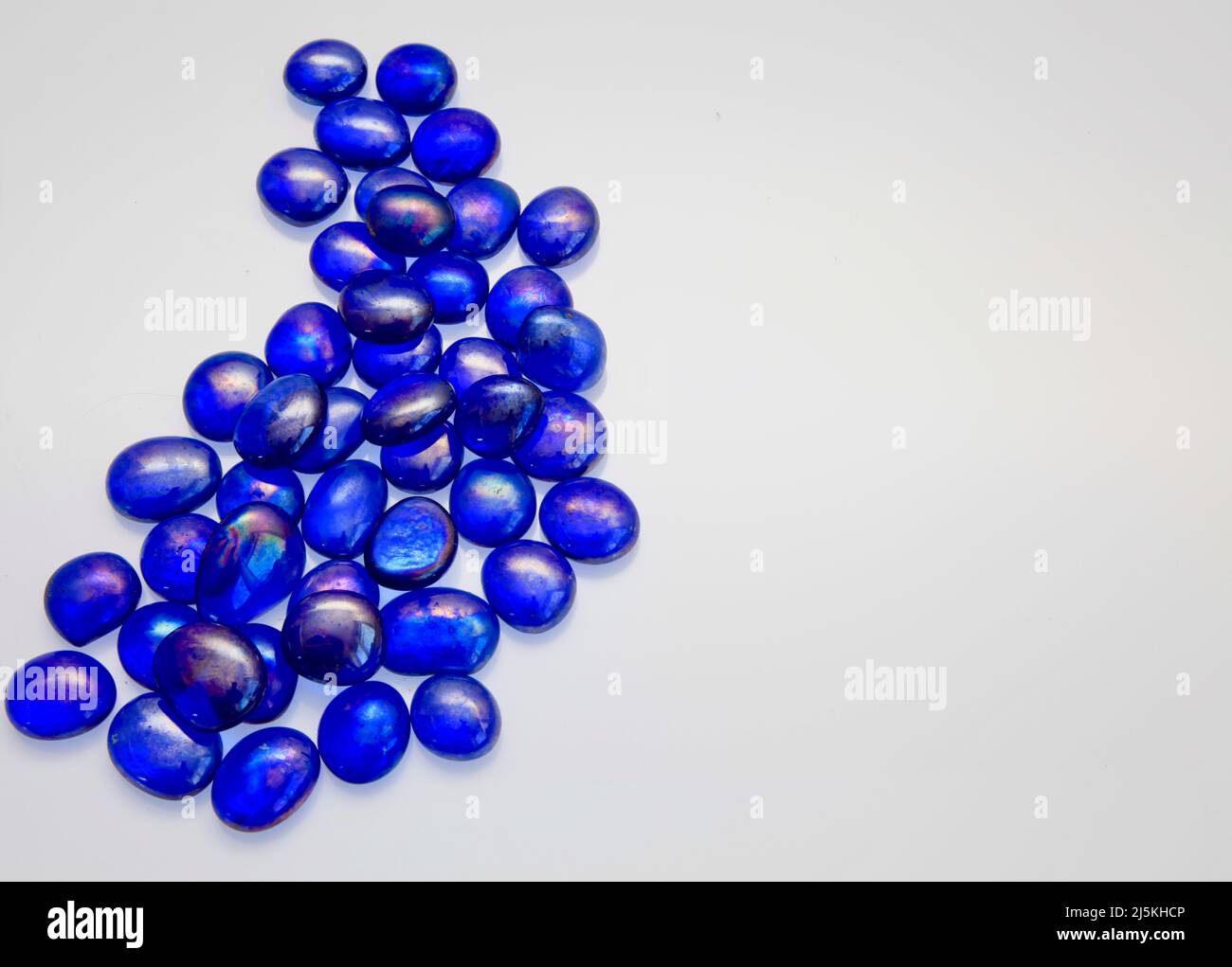 Blue glass bead patterns on white background April 2022 Stock Photo Alamy