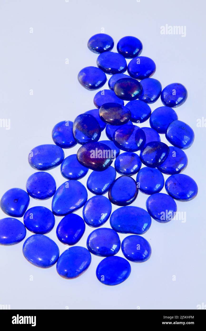 Blue glass bead patterns on white background April 2022 Stock Photo Alamy