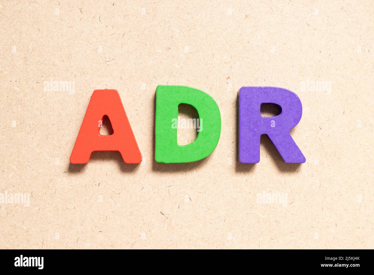 Color Alphabet Letter In Word ADR Abbreviation Of Adverse Drug Reaction On Wood Background 