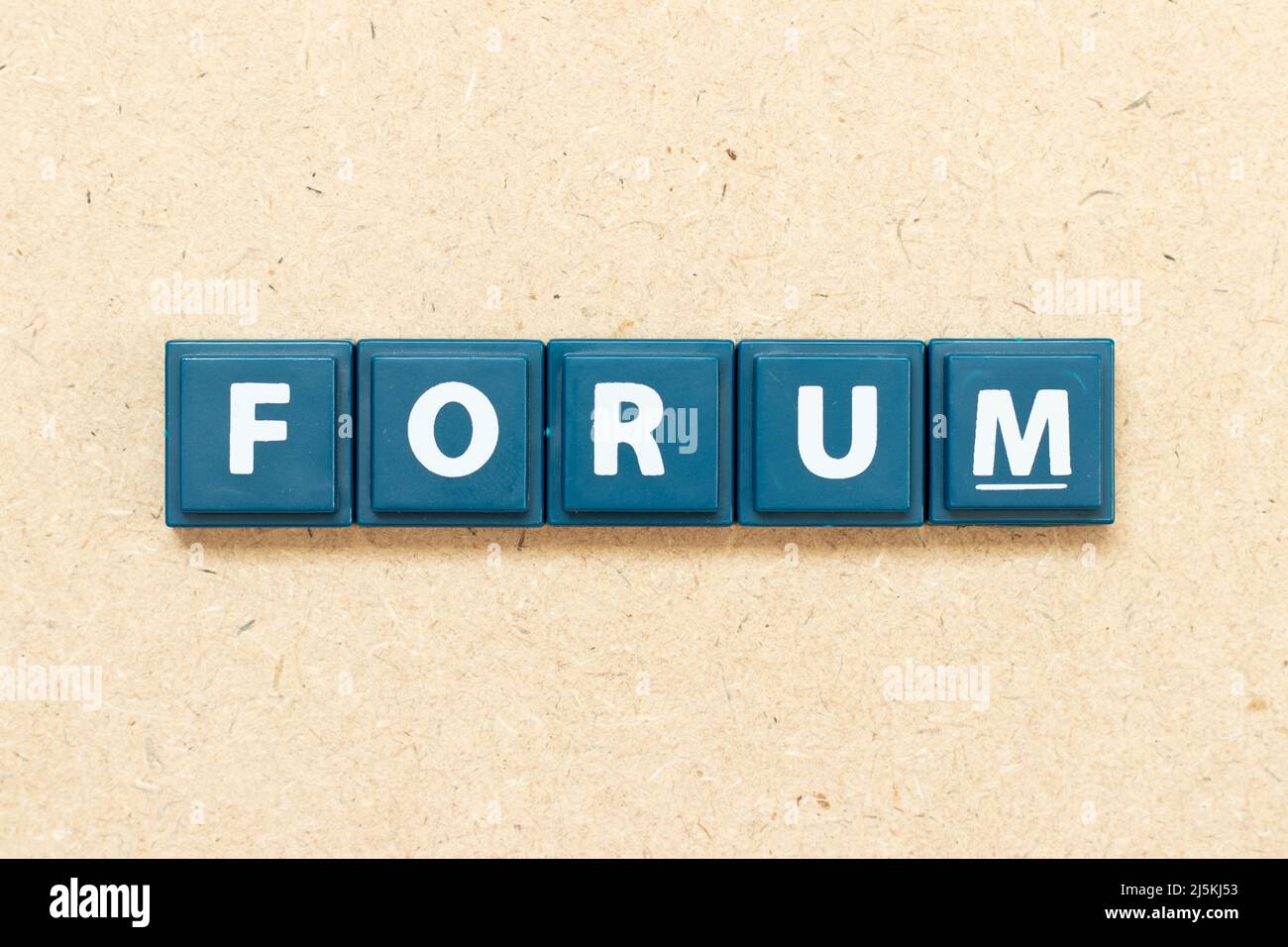 Tile alphabet letter in word forum on wood background Stock Photo Alamy