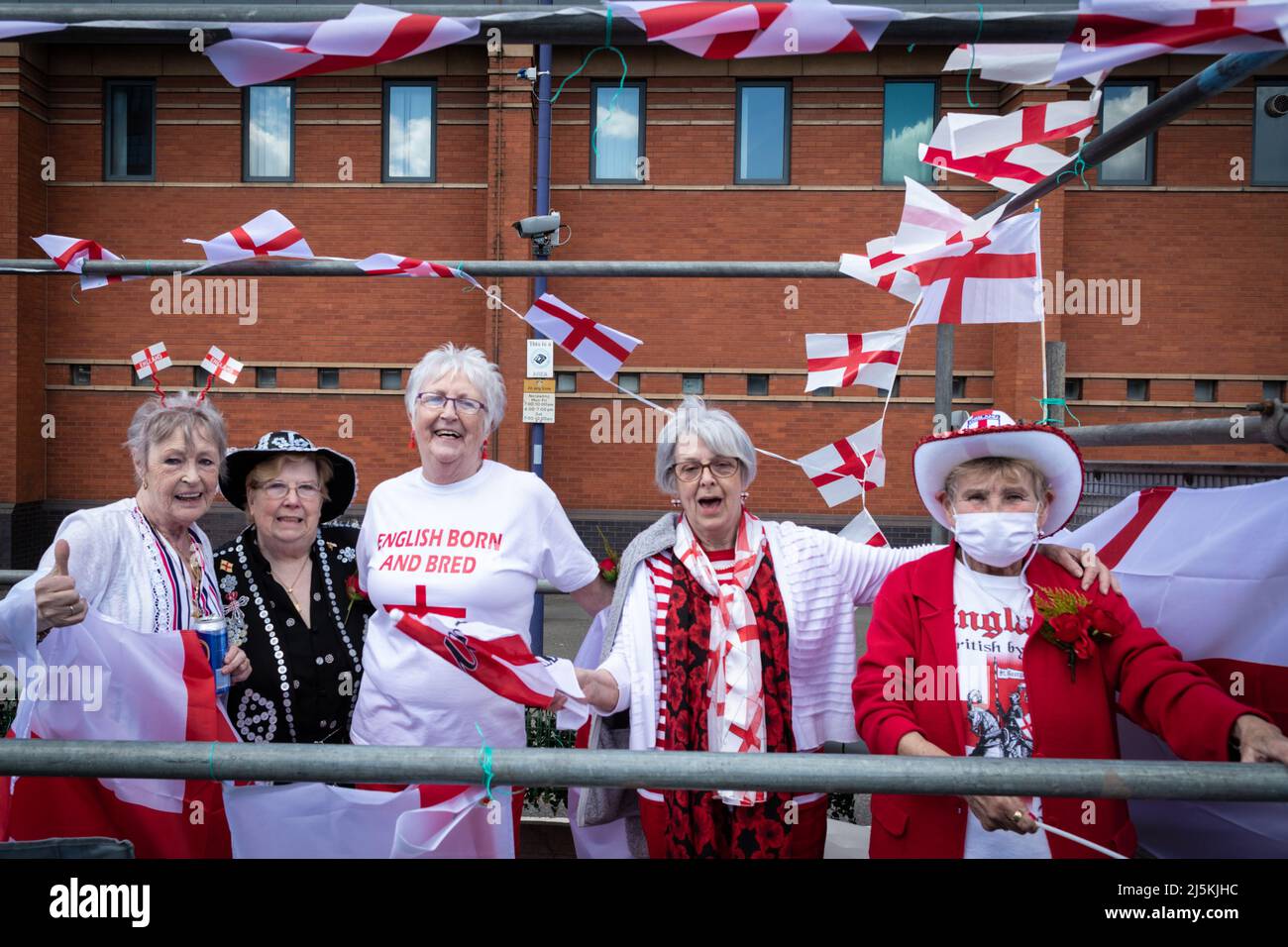 Manchester, UK. 24th Apr, 2022. People dressed up in red and white outfits join the annual St Georges Day celebration which marks the death of the patron Saint Of England.ÊAndy Barton/Alamy Live News Credit: Andy Barton/Alamy Live News Stock Photo