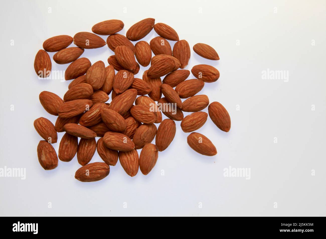 Almonds against a white background April 2022 Stock Photo
