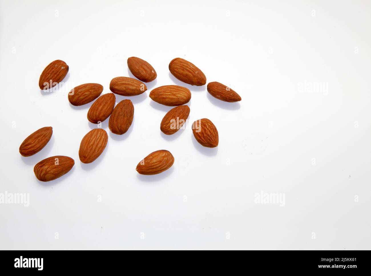 Almonds against a white background April 2022 Stock Photo