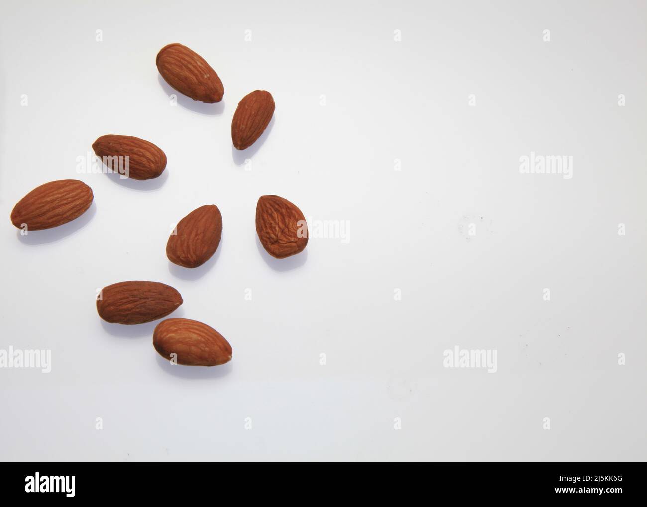 Almonds against a white background April 2022 Stock Photo