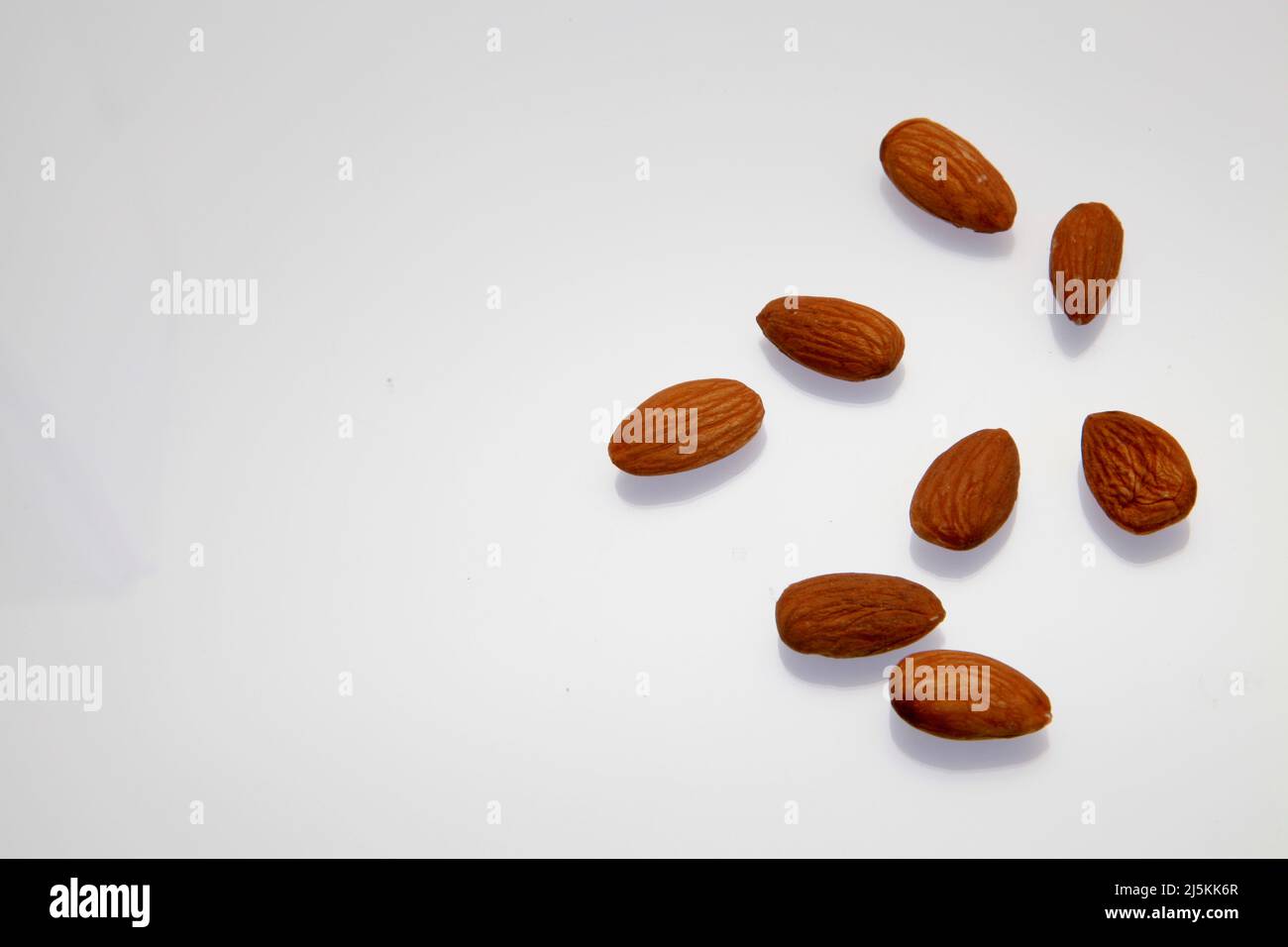 Almonds against a white background April 2022 Stock Photo