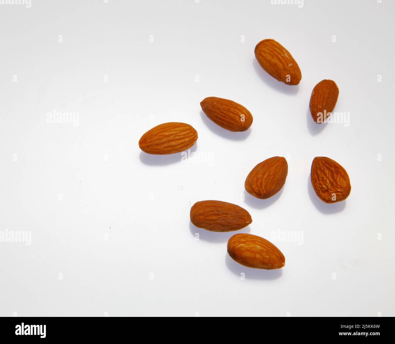 Almonds against a white background April 2022 Stock Photo