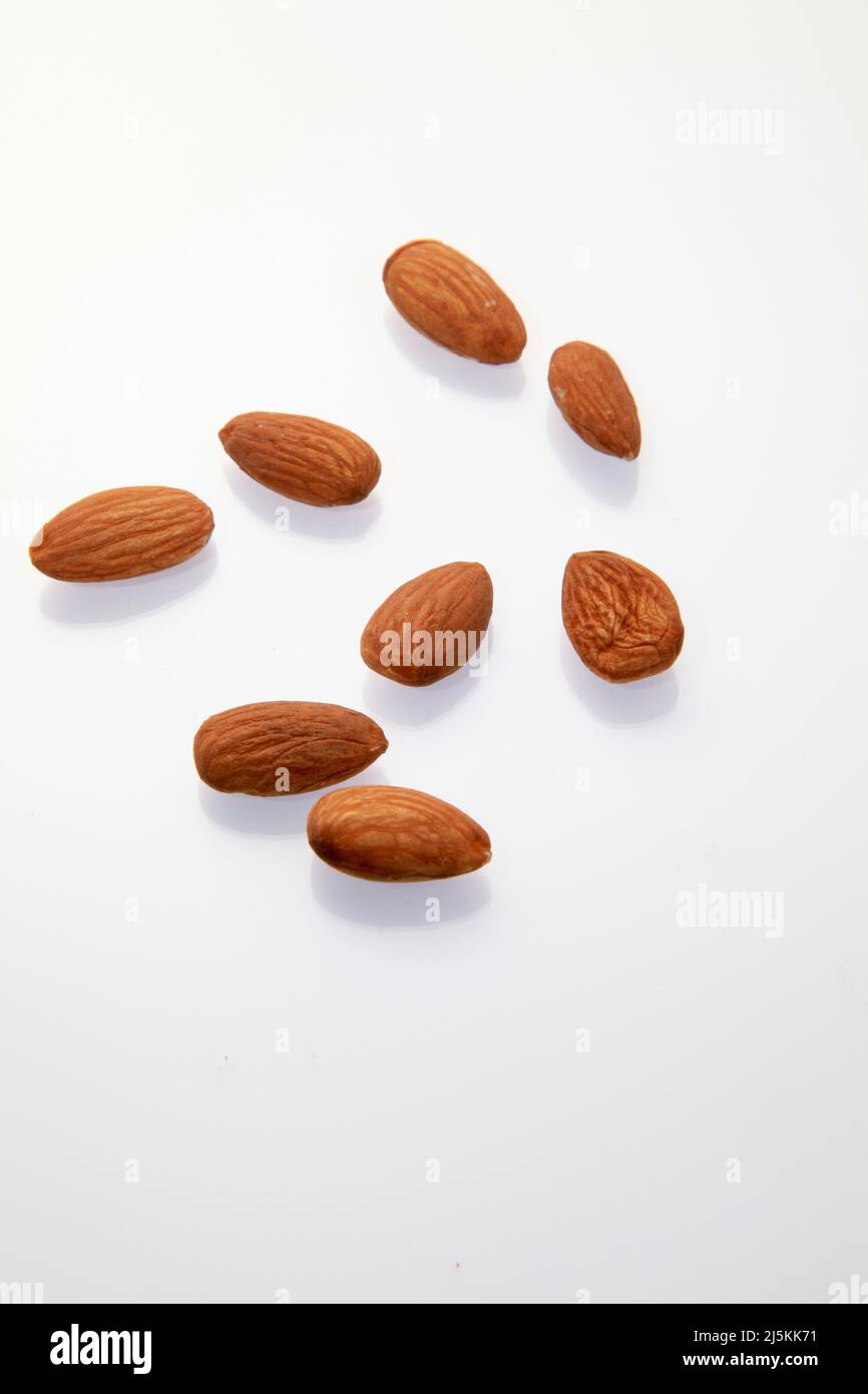 Almonds against a white background April 2022 Stock Photo