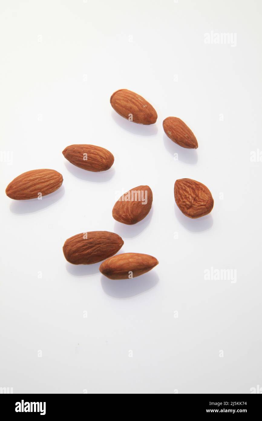 Almonds against a white background April 2022 Stock Photo