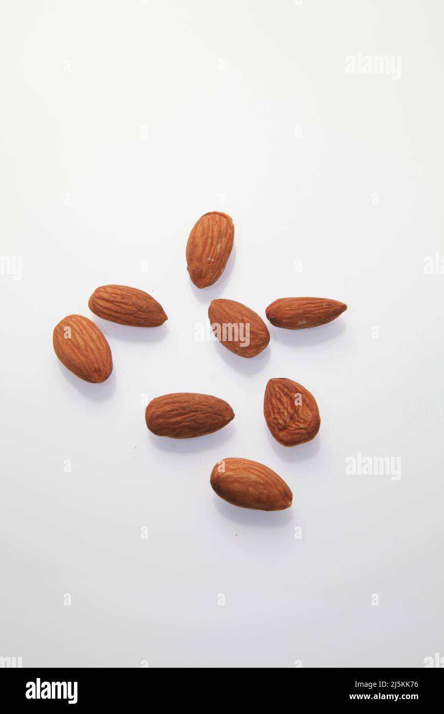 Almonds against a white background April 2022 Stock Photo