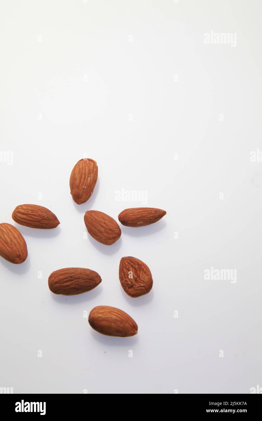 Almonds against a white background April 2022 Stock Photo