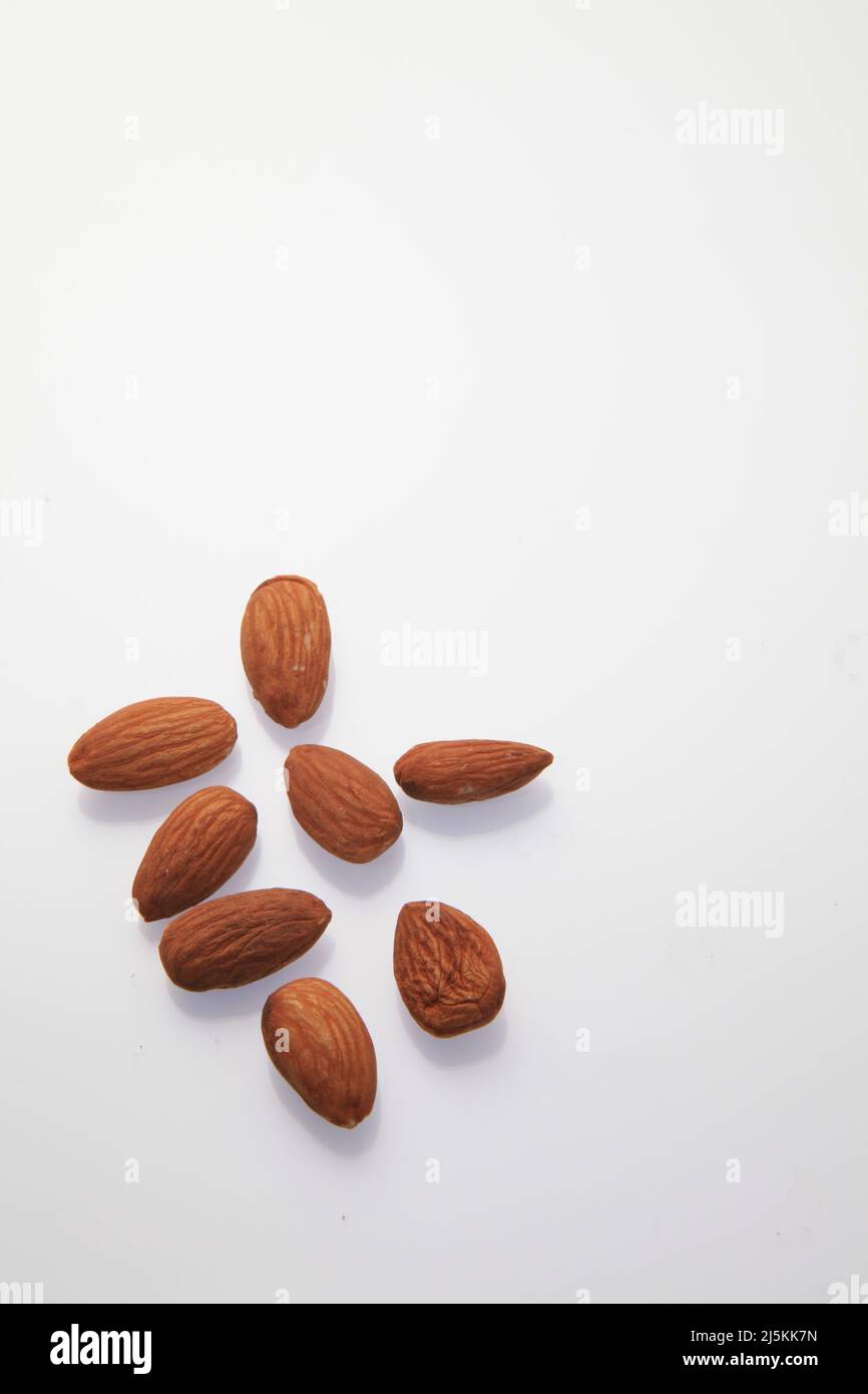 Almonds against a white background April 2022 Stock Photo