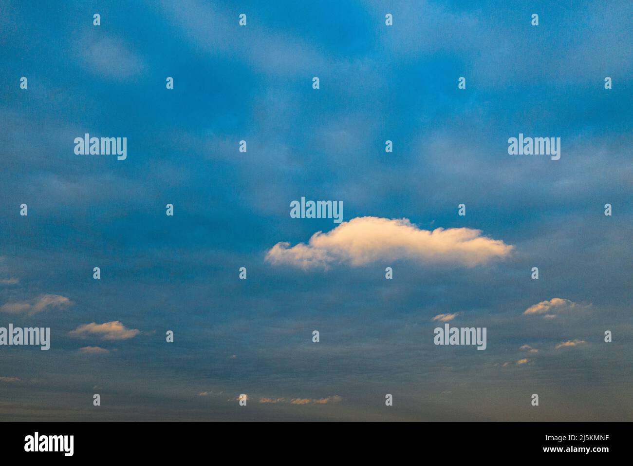 Scenic landscape of sunset sky with clouds above sea Stock Photo - Alamy