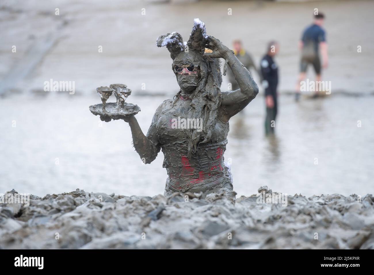 Maldon, Essex, UK. 24th April 2022. Competitors take part in the Maldon Mud Race in Maldon, Essex on April 24th 2022 as the race returns for the first time in two years. Credit: Lucy North/Alamy Live News Stock Photo