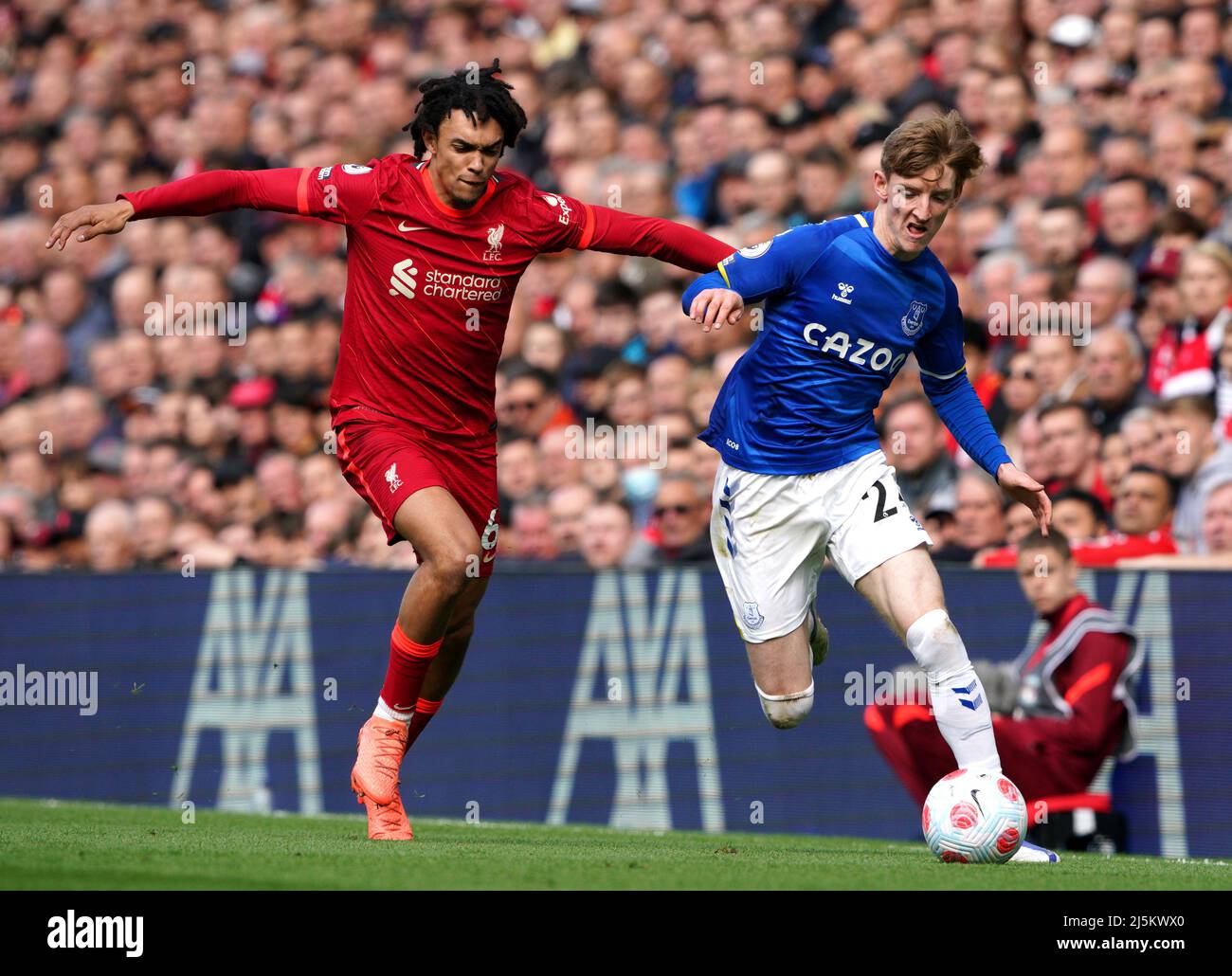 Liverpool's Trent Alexander-Arnold (left) and Everton's Anthony Gordon battle for the ball during the Premier League match at Anfield, Liverpool. Picture date: Sunday April 24, 2022. Stock Photo