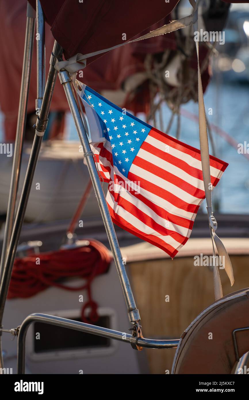 American flag hanging down from a boat Stock Photo Alamy