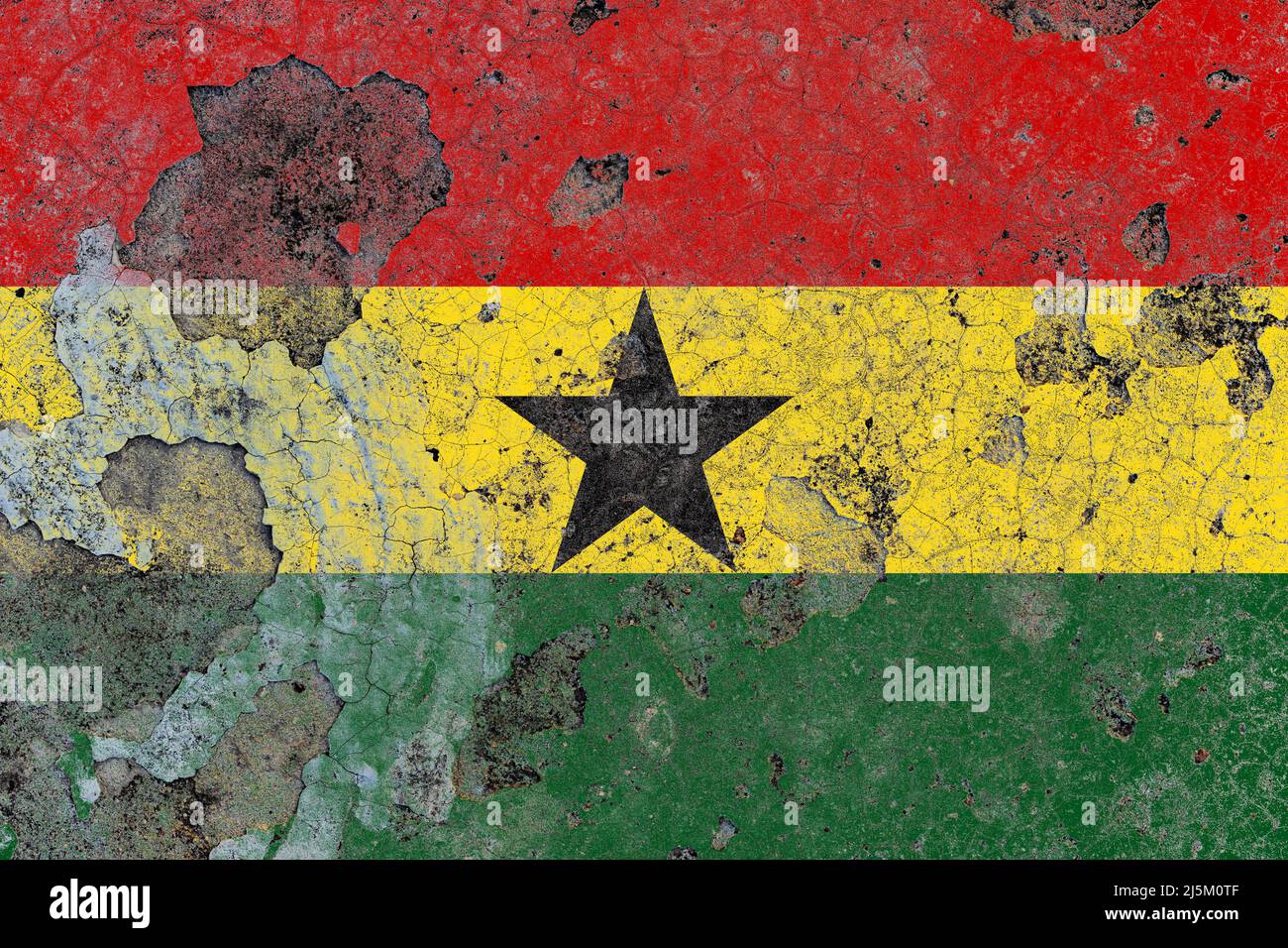 Ghana flag on a damaged old concrete wall surface Stock Photo