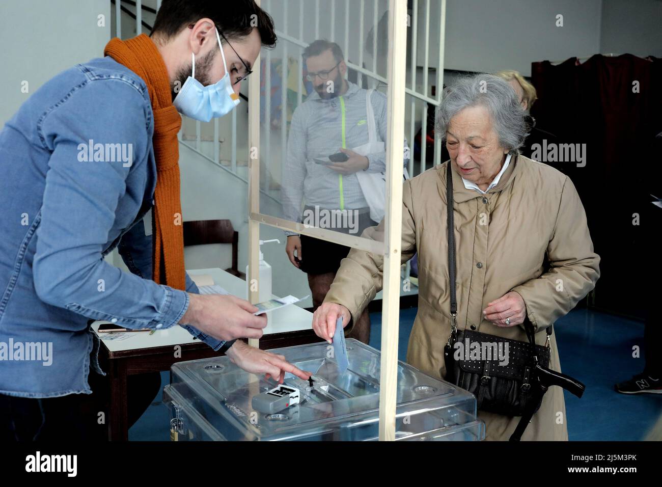 Paris, France. 24th Apr, 2022. A French resident votes on the last round of presidential elections in Paris, France, on Sunday April 24, 2022. French citizens went to the polls to choose between far-right candidate Marine Le Pen and outgoing President Emmanuel Macron. Photo by Maya Vidon-White/UPI Credit: UPI/Alamy Live News Stock Photo