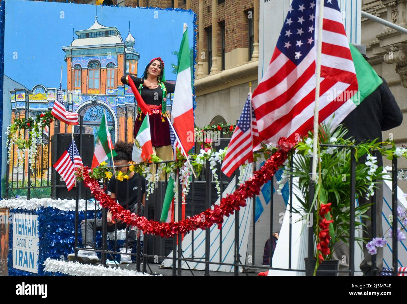 IranianAmerican wearing traditional outfits dance on a float through Madison Avenue during the