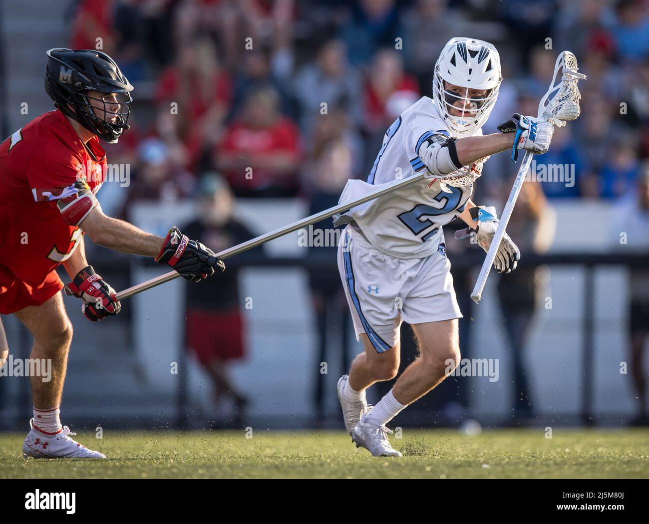 April 23, 2022: Johns Hopkins midfielder Jacob Angelus (23) maneuvers behind the net during the ncaa men's lacrosse regular season finale between the Maryland Terrapins and the Johns Hopkins Blue Jays at Homewood Field in Baltimore, Maryland Photographer: Cory Royster Stock Photo