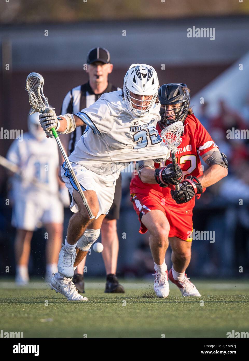 April 23, 2022: Johns Hopkins fo Logan Callahan (35) and Maryland fo Luke Wierman (52) during the ncaa men's lacrosse regular season finale between the Maryland Terrapins and the Johns Hopkins Blue Jays at Homewood Field in Baltimore, Maryland Photographer: Cory Royster Stock Photo