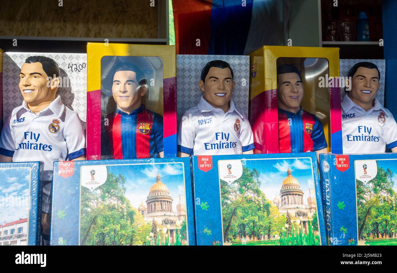 August 14, 2018, Moscow, Russia. Dolls with the image of football players Cristiano Ronaldo and Lionel Messi on the counter. Stock Photo