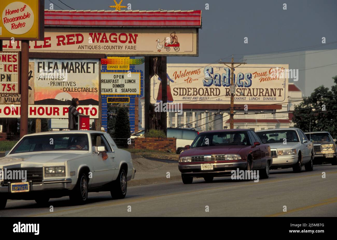 Branson, Missouri USA July 16, 1994: Road signs and advertising clutter the scenery along Highway 76 in Branson, Missouri. Stock Photo