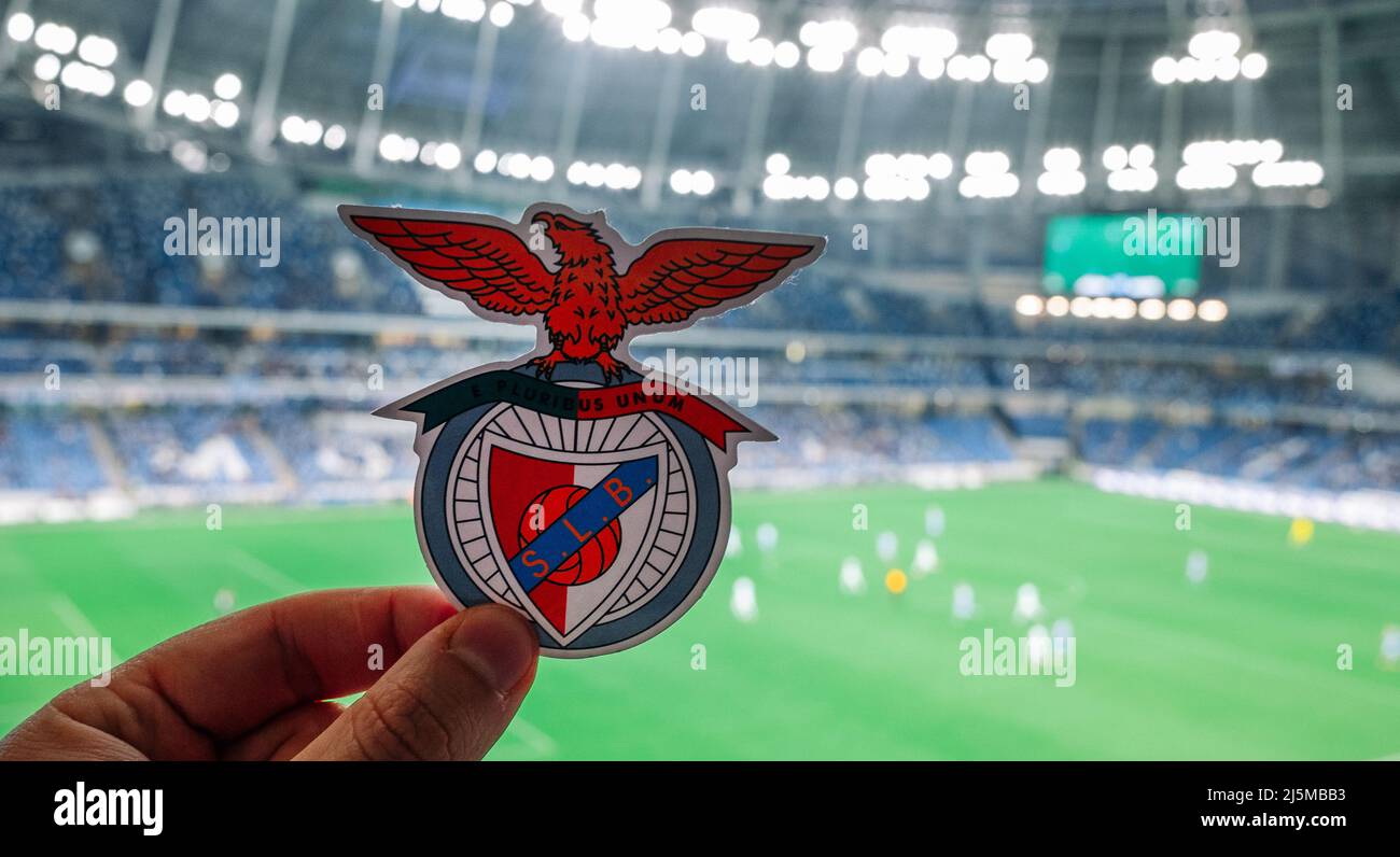 September 12, 2021, Lisbon, Portugal. football club emblem S.L.  Benfica against the backdrop of a modern stadium. Stock Photo