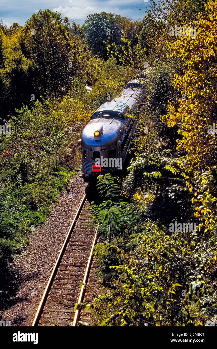 Branson, Missouri USA September 29, 2001: The Branson Scenic Railway train rolls through the hills sporting early autumn colors giving passengers a spectacular view from the doomed observation cars. Stock Photo