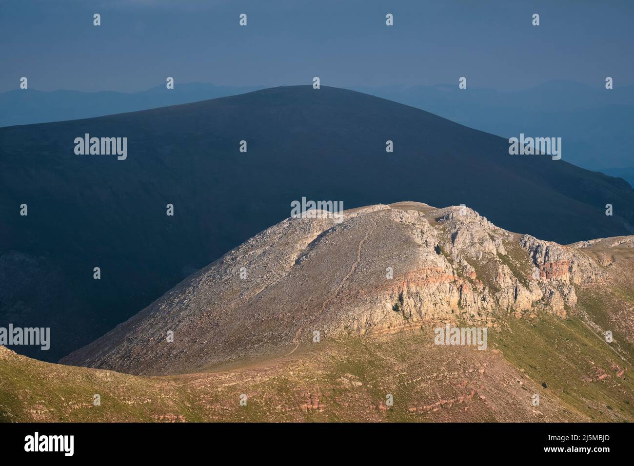 Afternoon sun over the surroundings of the summit of Tosa d'Alp or La Tosa with Puigllançada in the background. Catalonia. Spain. Stock Photo