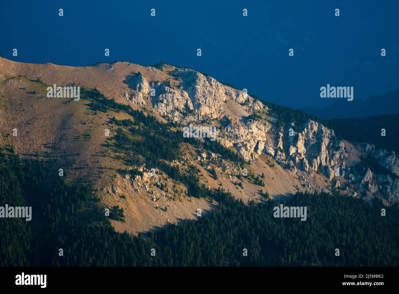 Afternoon sun over rocky slopes. Cadi-Moixero Natural Park. Catalonia. Spain. Stock Photo