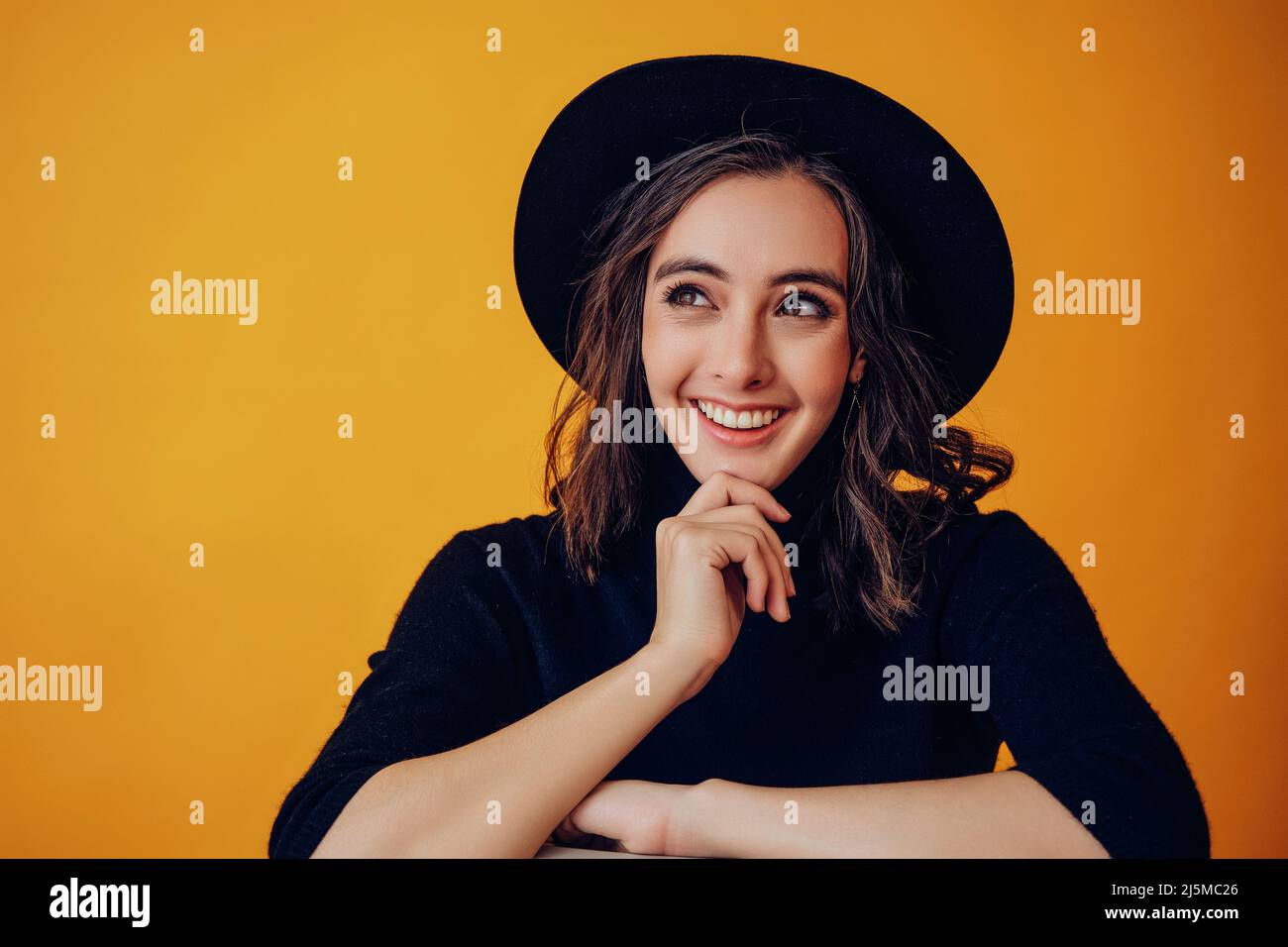 Woman chin looking up happy hi-res stock photography and images - Alamy
