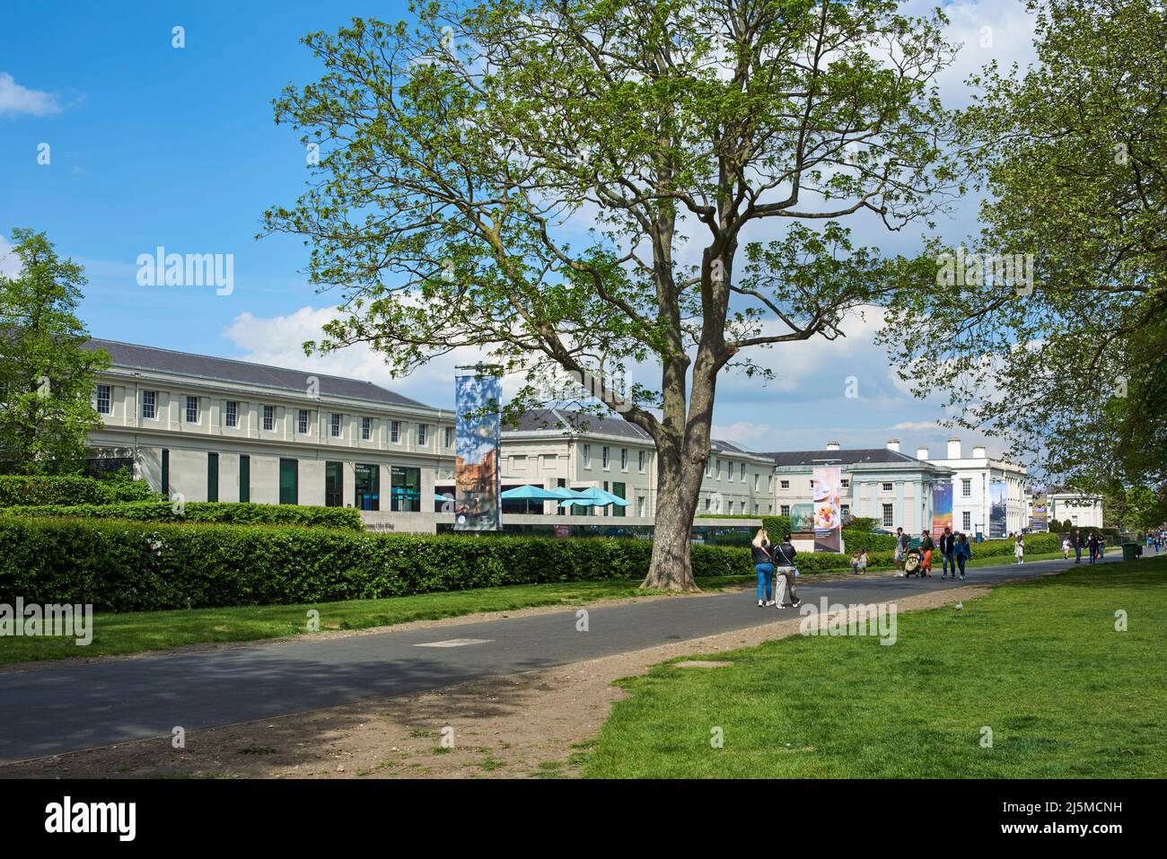 The north end of Greenwich Park in spring, South East London UK, with the National Maritime Museum buildings Stock Photo